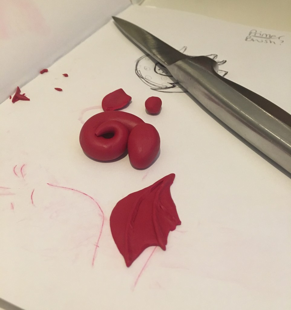 How to make a tiny fimo clay dragon