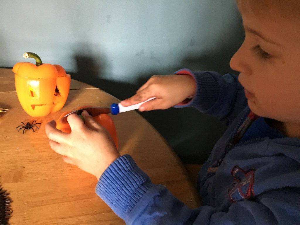 9 Halloween Craft Projects for Kids - orange pepper carving