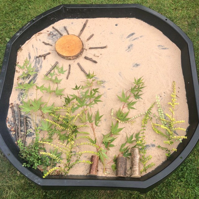 spring time play and learn activities outdoors - tuff tray play