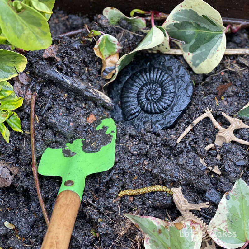 Digging for fossils in mud